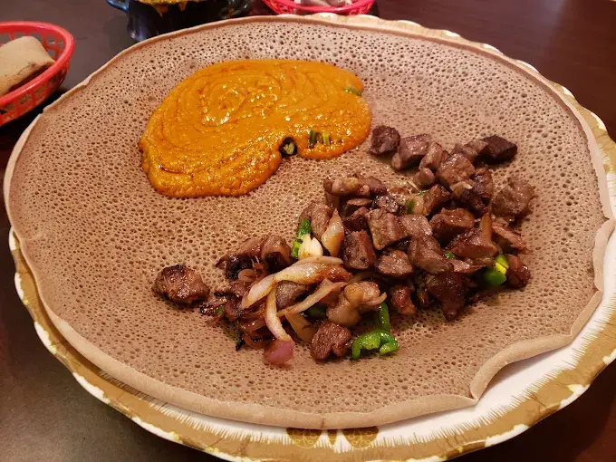 Authentic Ethiopian food served on injera at Gohe Ethiopian Restaurant Winnipeg